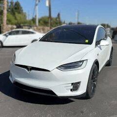 Скачать взломанную Electric Tesla Model X Driver [Много денег] MOD apk на Андроид